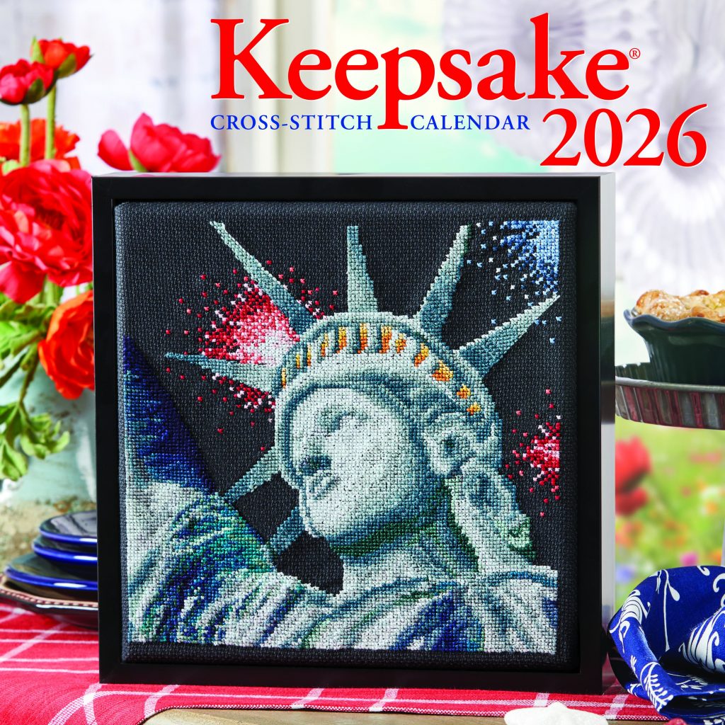 Cover of the Keepsake 2026 Calendar featuring a cross-stitch framed design of the Statue of Liberty